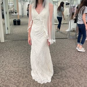 Never worn wedding dress! Size 0